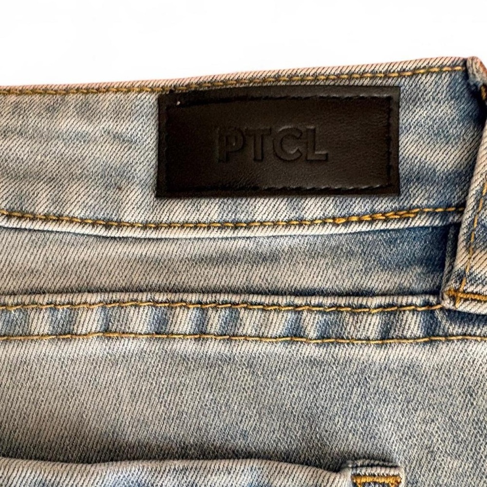 Stylish Light Blue Flare Jeans with Navy Accents - Picture 8 of 8
